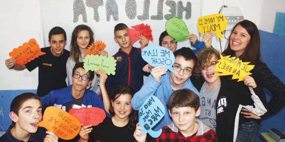 Molly Yurick (left) with students at the Instituto de Educación Secundaria Cuenca del Nalón in Asturias, Spain.